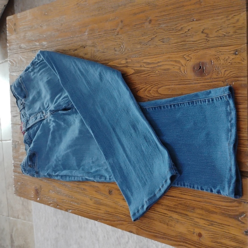 NYDJ  jeans size 12 boot cut medium blue wash faded